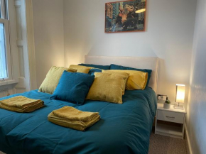 Wall St flat by HNFC Stays - Netflix & Popcorn